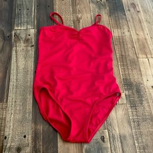 This is a red leotard from Balera. It’s a size LC.